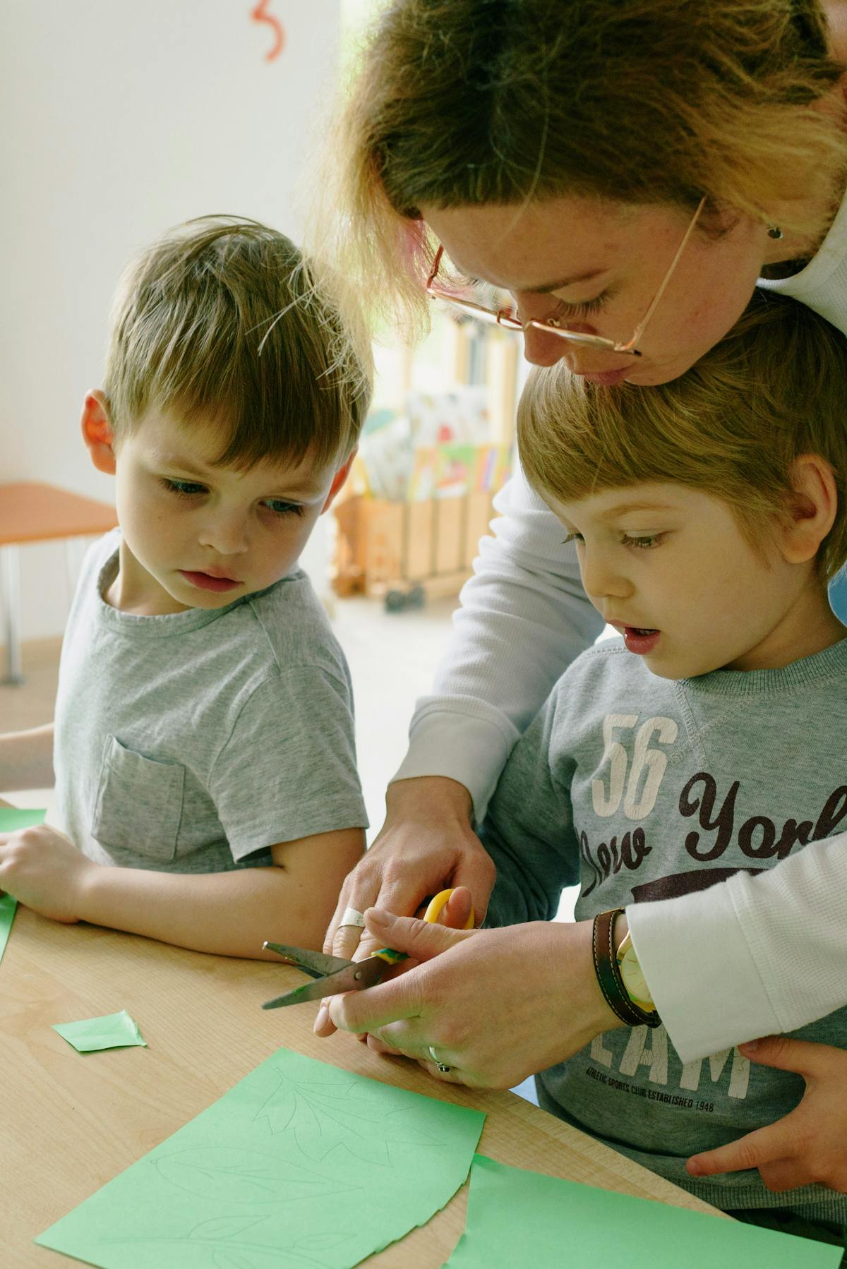 A caring teacher with children